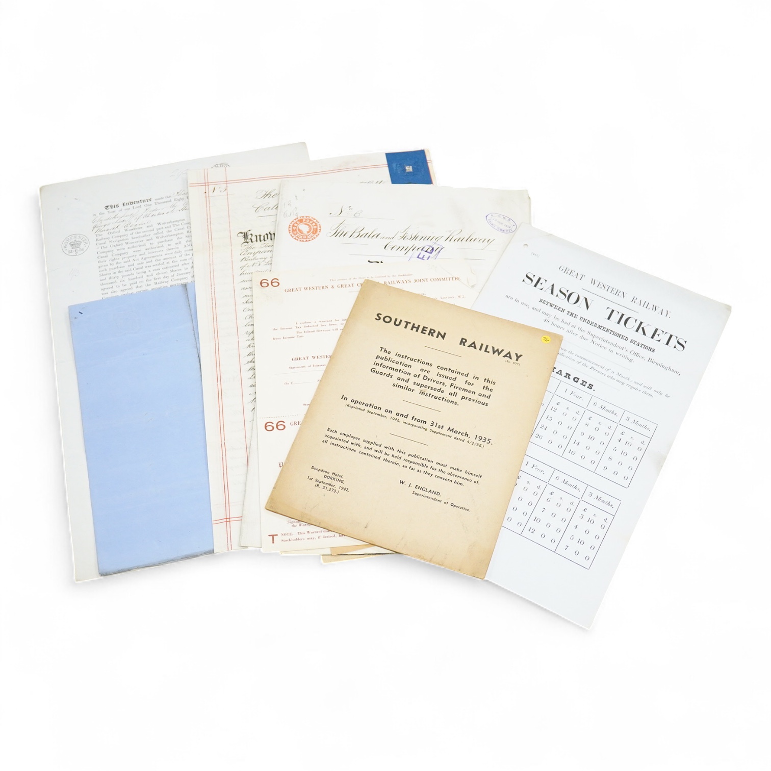 Railway related documents including; a GWR season ticket flyer dated 1854, a Southern Railway instruction booklet for drivers, firemen and guards, share certificates, 1940s and 50s temporary timetables, a Festiniog Railw